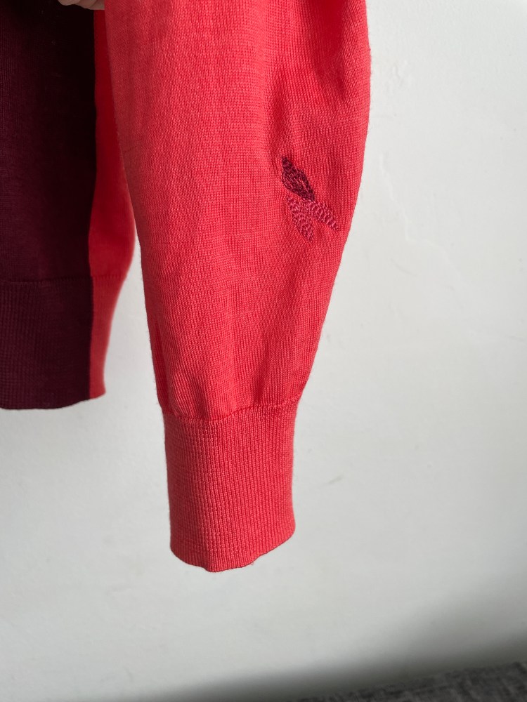 running stitch leaves in pink and Burgundy on pink fine knitted fabric